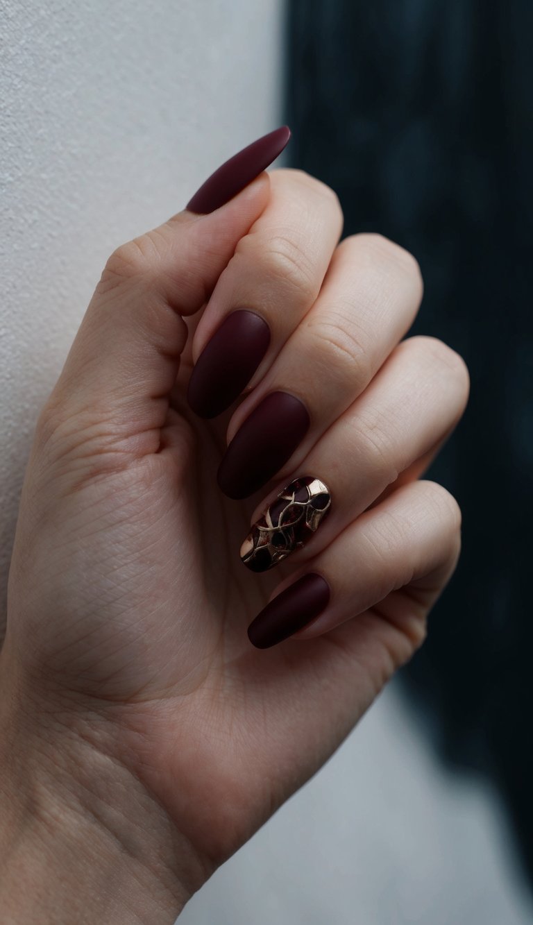Deep red nails against a dark, moody background, evoking a mysterious and captivating atmosphere