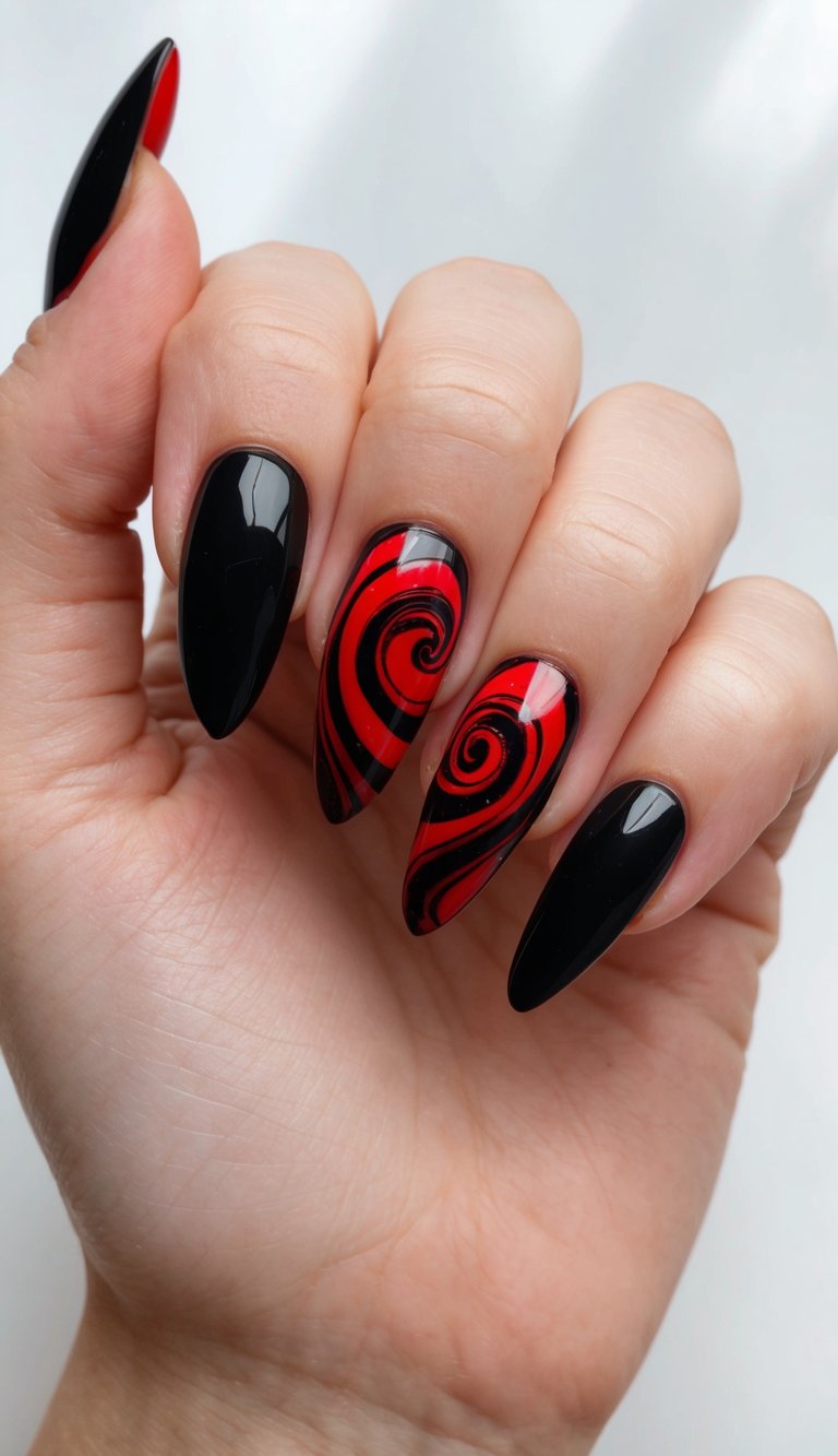 Elegant hand pose showcasing red and black wedding nails, including sleek black almond nails and vibrant red accent nails finished with dramatic swirling black patterns.
