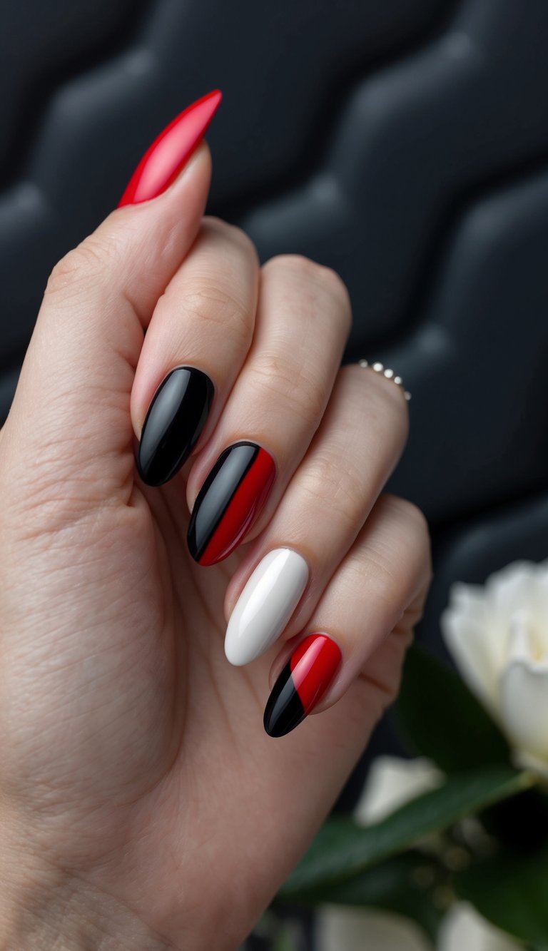 Close-up of a feminine hand styled in red and black wedding nails, featuring high-gloss black polish, sharp red diagonal accents, and a single creamy white almond nail.