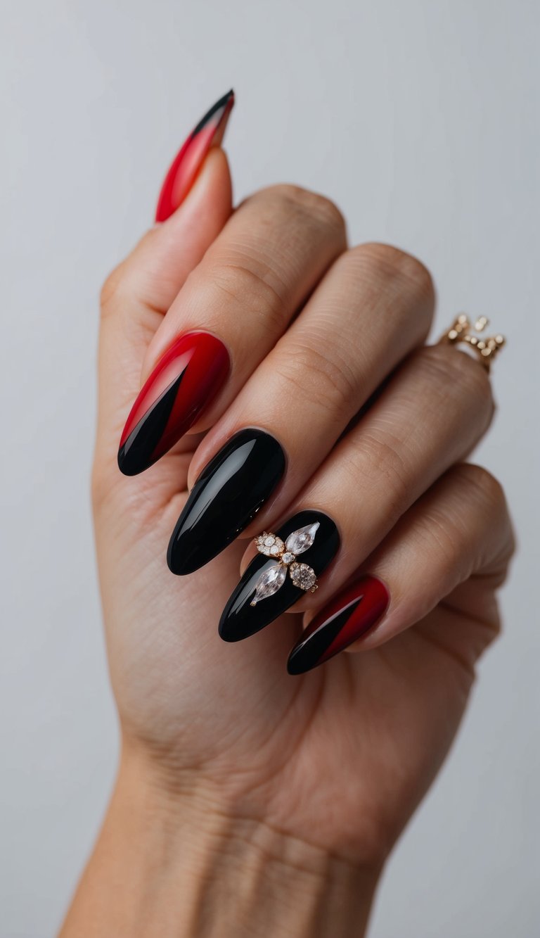 Close-up of almond-shaped red and black wedding nails showing red fading into black tips, high-shine black polish, and a statement nail decorated with a sparkling crystal flower design.